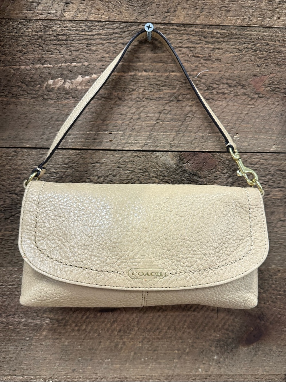 Coach Pebbled Leather Clutch in Light Beige